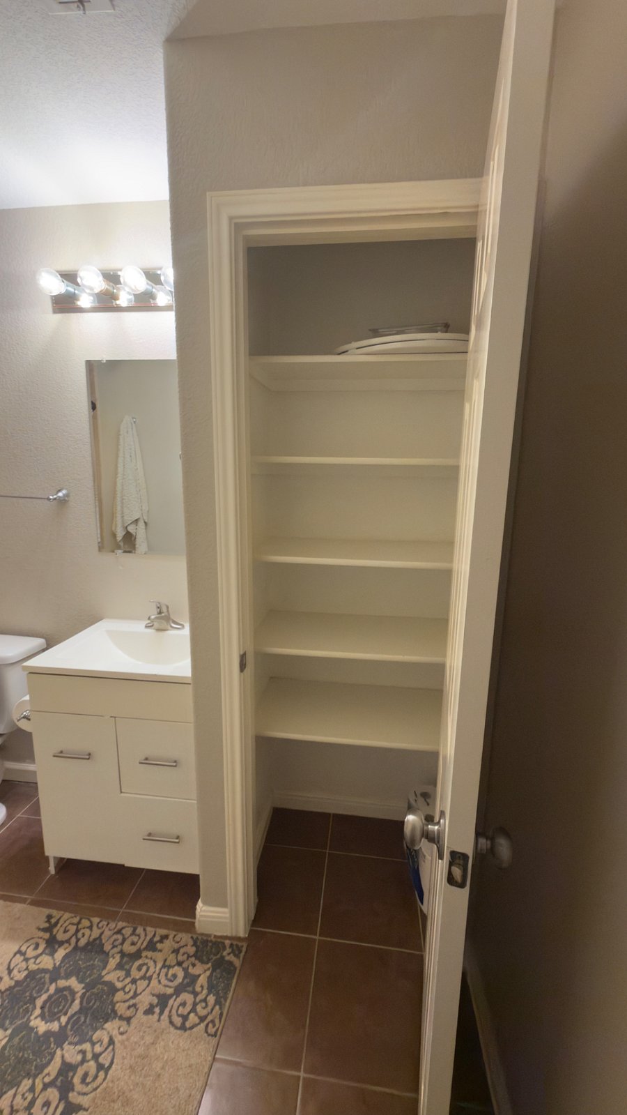 shared bathroom linen closet