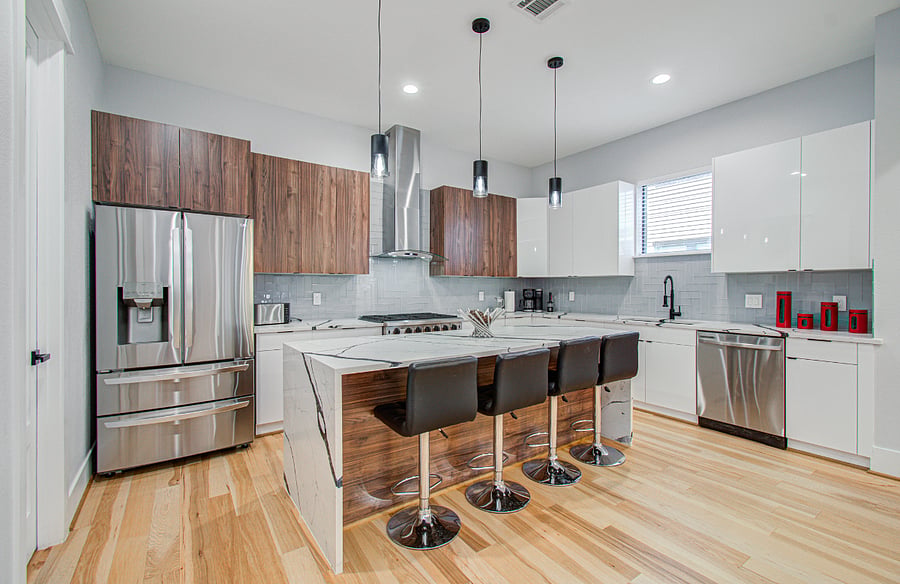Enjoy a fully equipped gourmet kitchen with stainless steel appliances, ample counter space, and everything needed to prepare meals during extended stays. Designed for both convenience and comfort.