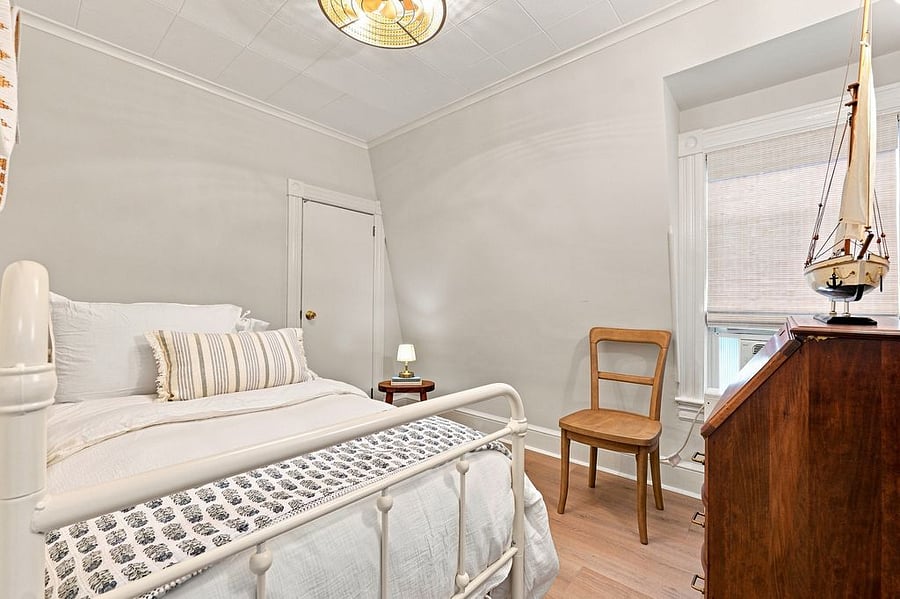 Bedroom that sleeps 2 (Twin Trundle Bed) and Secretary Desk to be used as a dresser as well as a work station