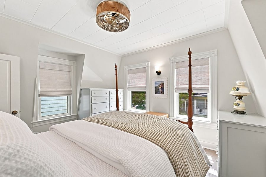 Warm and comfortable front facing bedroom with Queen sized bed and built in dressers