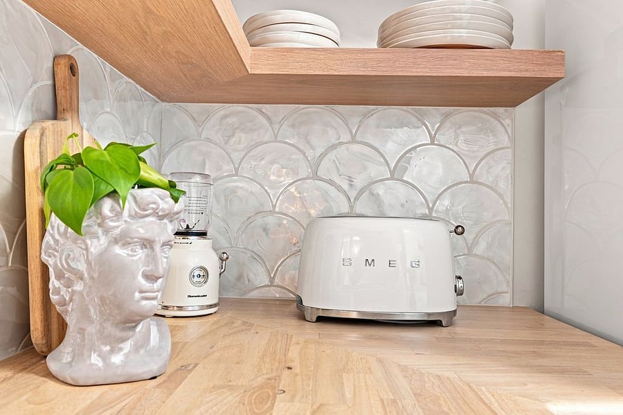 Enjoy a smoothie or easy morning breakfast with toast or frozen waffles prepared in our charming Smeg appliances