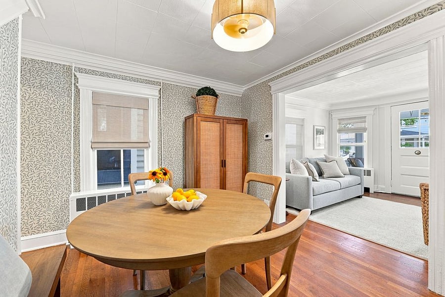 Charming dining room seats 4-5 people, with a separate extension leaf for comfortably accommodating additional guests