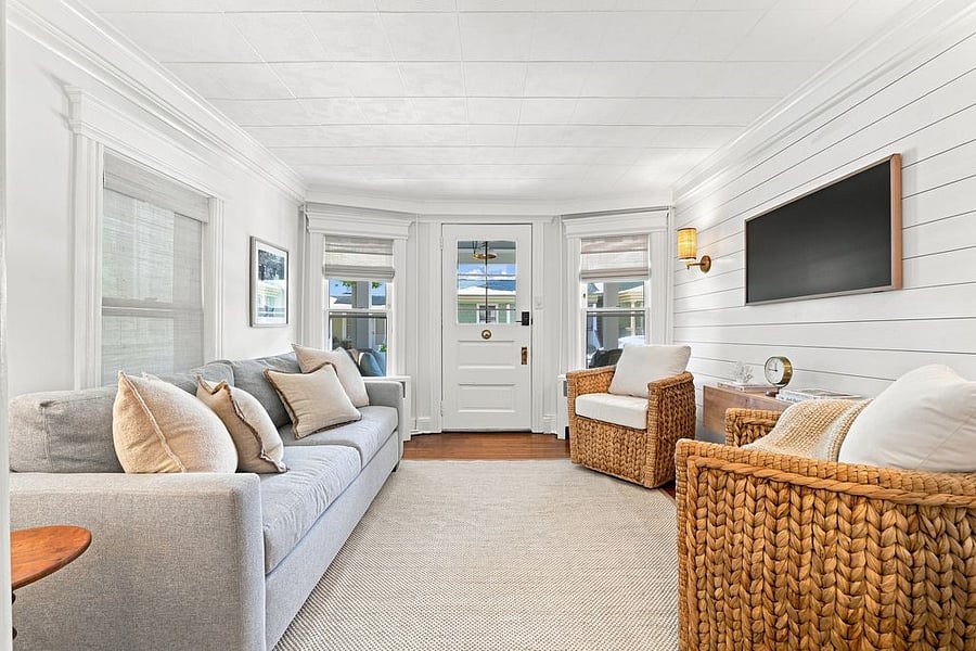 A warm, inviting living space filled with plush comfort, soft textures, and all the comforts of home