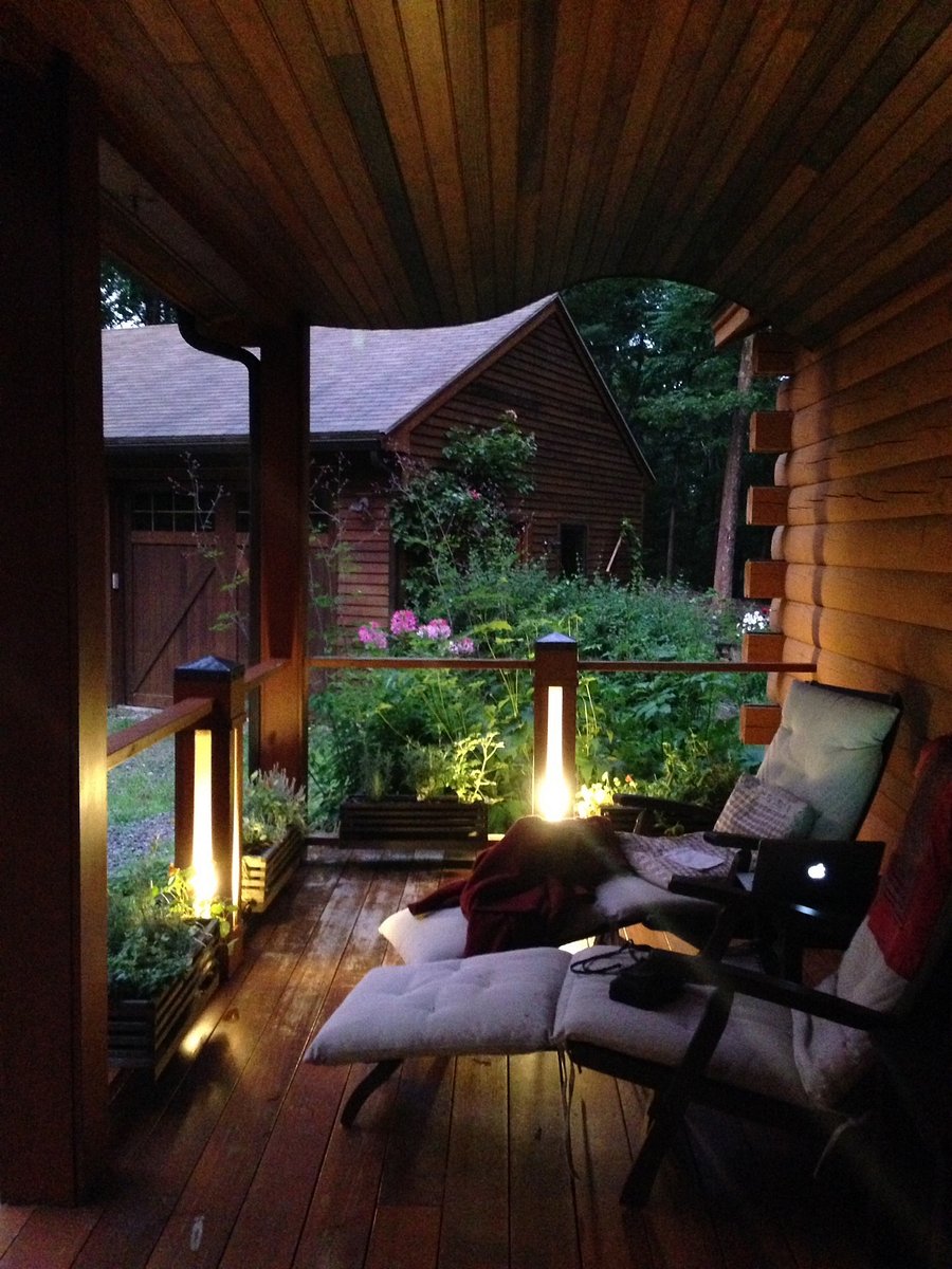 Front porch at night available to tenant by arrangement