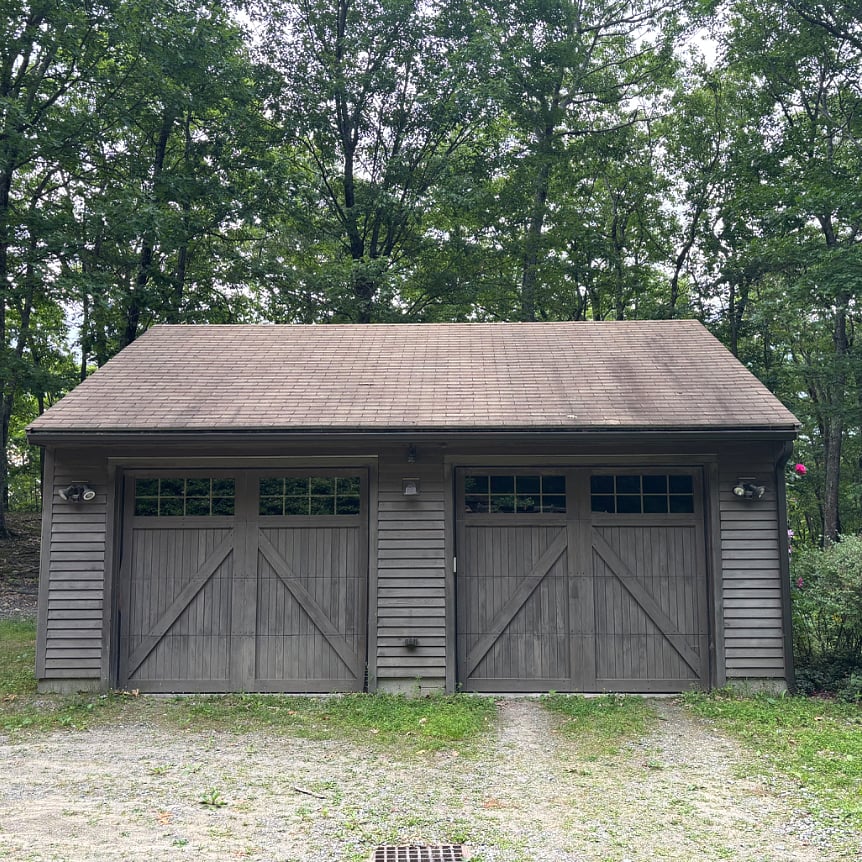 One garage bay for tenant parking, plus garage shelf space, tool workbench, and space for bicycle. 