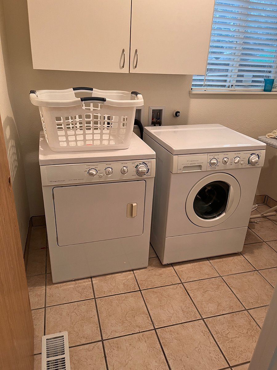 Washer and dryer with full size ironing board