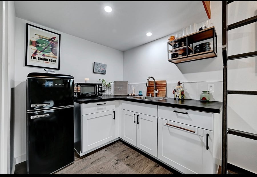 Kitchenette- microwave, air fryer, kitchen needs and a full fridge