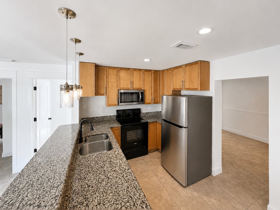 Clean, practical kitchen with full-size appliances and everything needed for a comfortable stay.