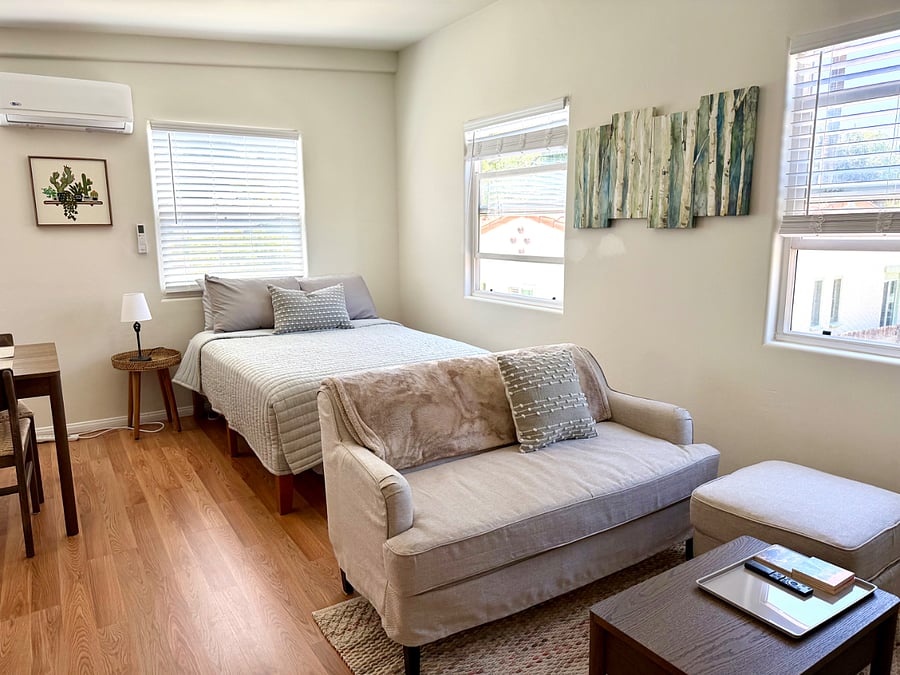 The space features a medium full-size medium firm hybrid bed. Extra linens are provided. 