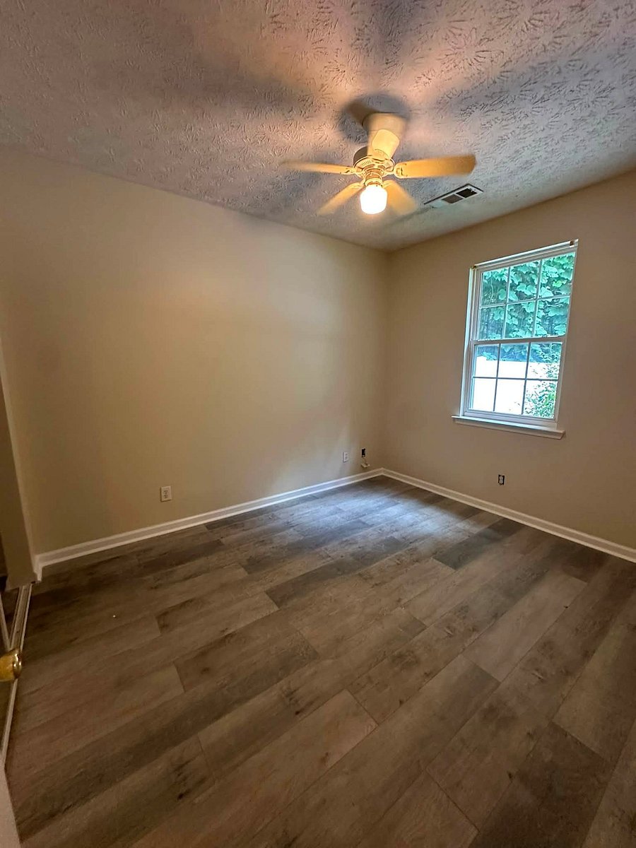 Bedroom 3. Back left corner of house. Window faces fenced back yard. 