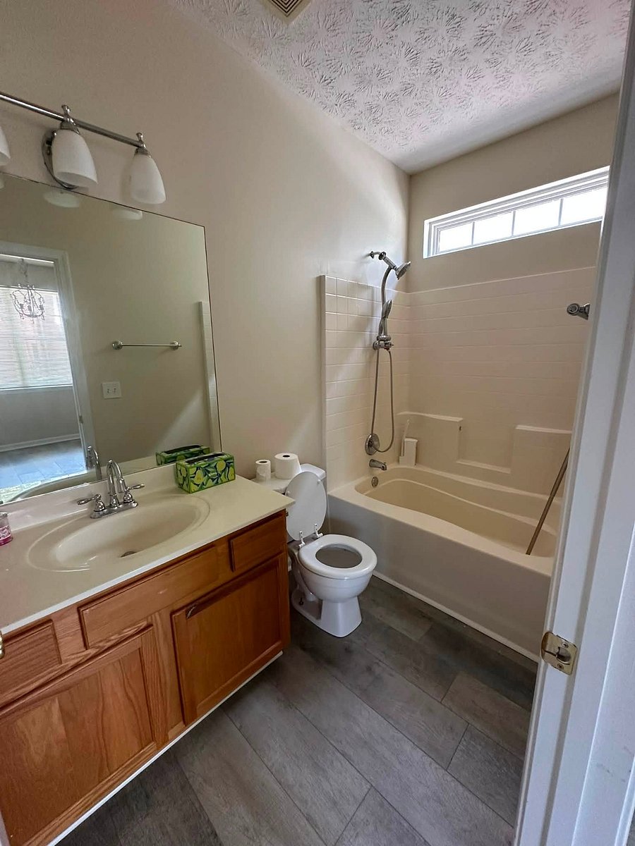Full bathroom with oversized tub. This bathroom is off master bedroom. 