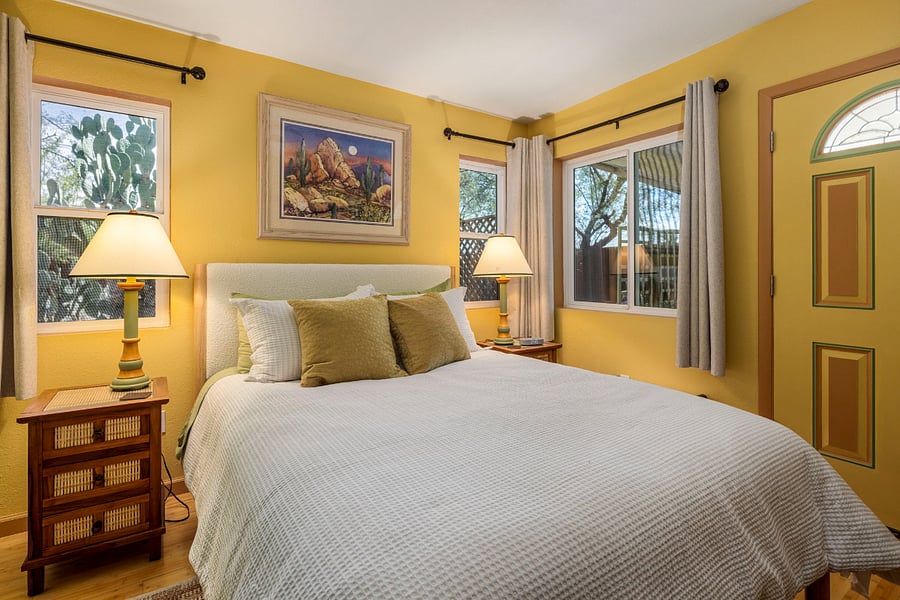 Natural light comes in through two south-facing windows and one west-facing window. Insulated, room-darkening linen drapes provide privacy and comfort year-round.