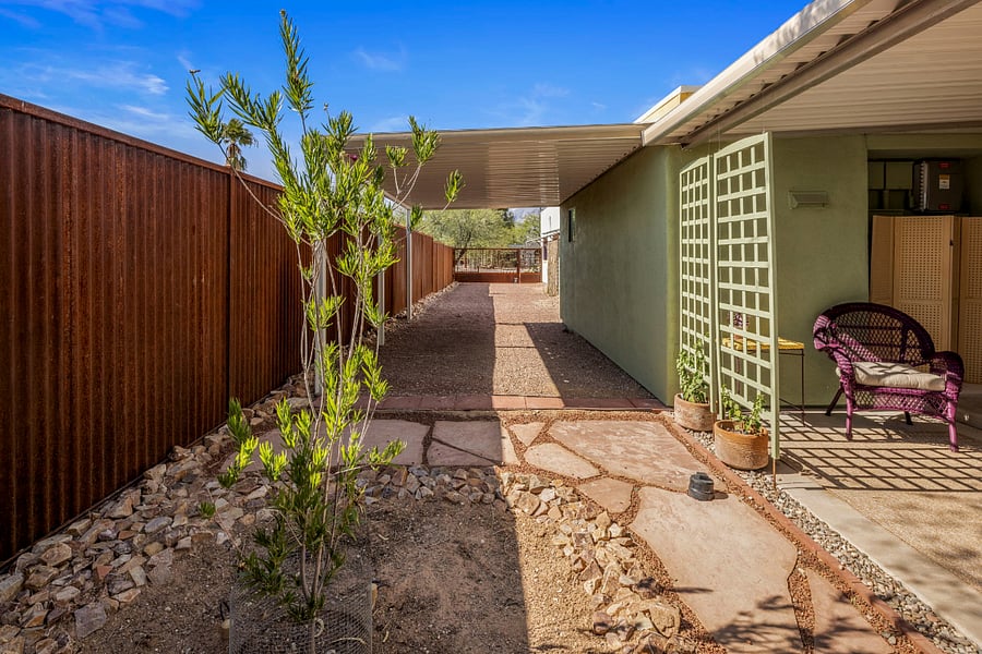 parking is steps away from a covered patio