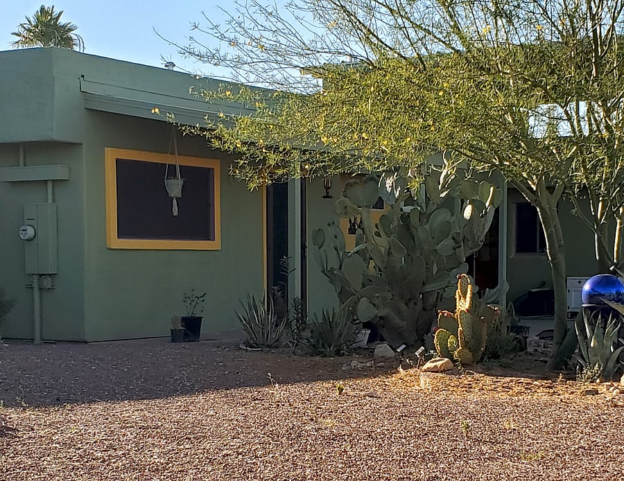 Back side of casita opens onto host patio and yard. 