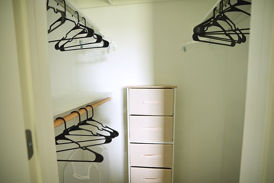 Large Closet with shelves, drawers and clothing racks