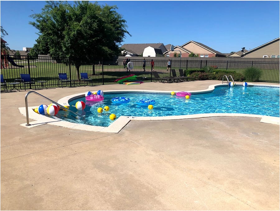 Community pool just a short walk down the street. Water bucket drop and splash corner not shown in photo.