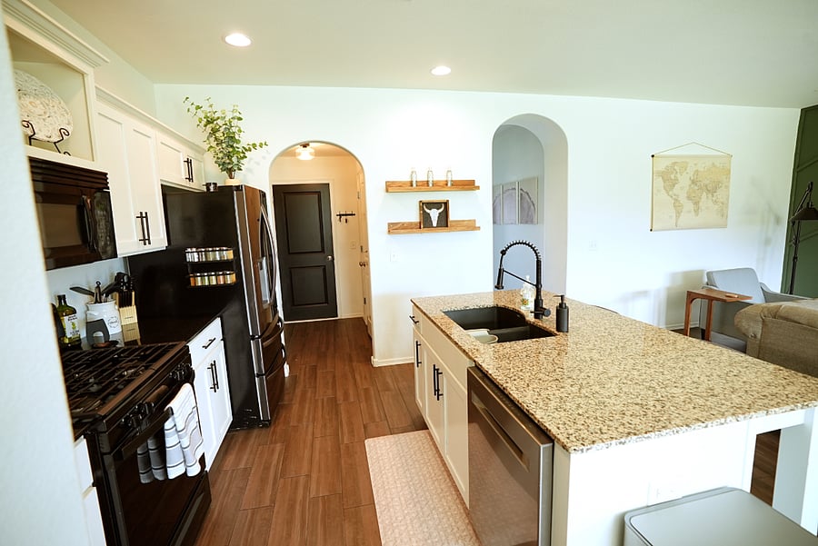 Kitchen Amenities, full size fridge, gas range, oven, microwave, large dishwasher. Stocked with cooking oils, seasonings, pots and pans and dishware.