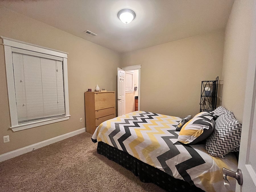 Bedroom 3 with private ensuite bathroom.