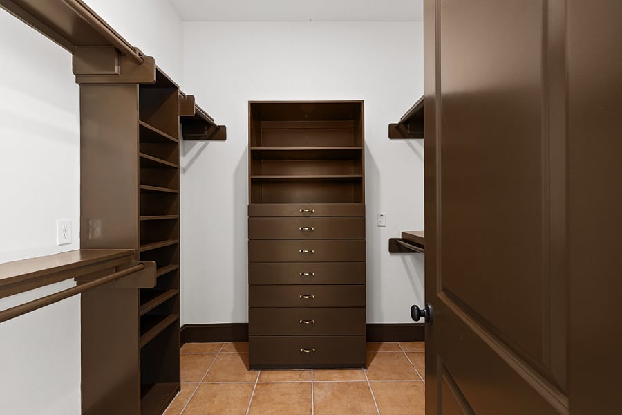 Separate His & Hers closets in primary bedroom