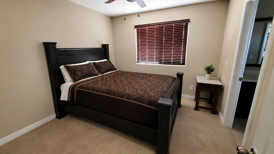 Fully furnished bedroom with a comfortable queen-size bed with WiFi and cable. Has a small walk in closet.
