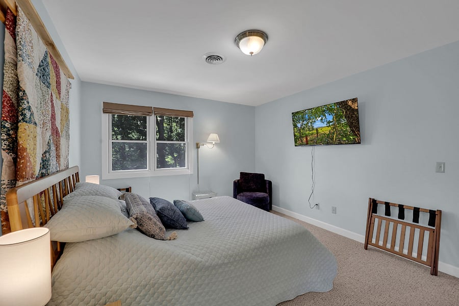 Bedroom 1 with a Queen bed and attached office