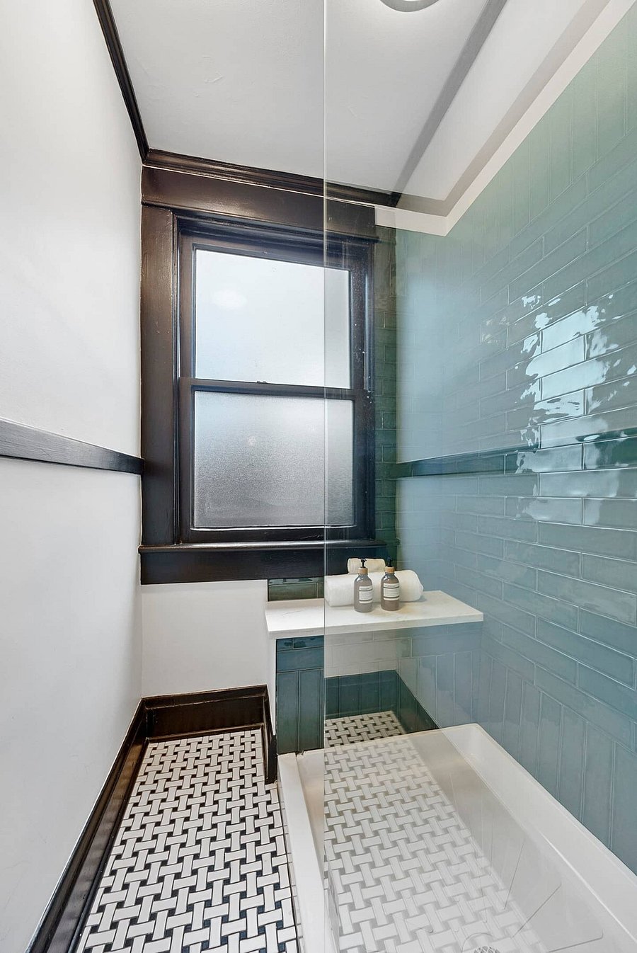 Walk in shower with body wash, shampoo & conditioner.