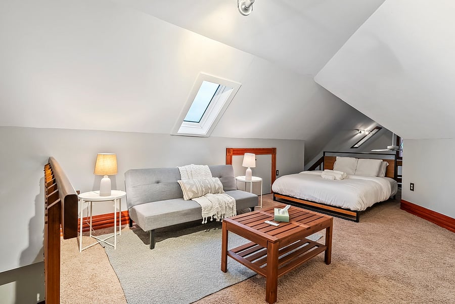 The third bedroom, in the loft, is the perfect spot for a relaxing afternoon with a book.
