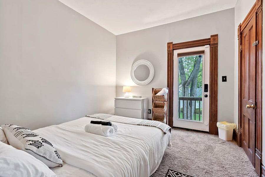 When entering the home via the back yard stairs, the back bedroom will greet you.