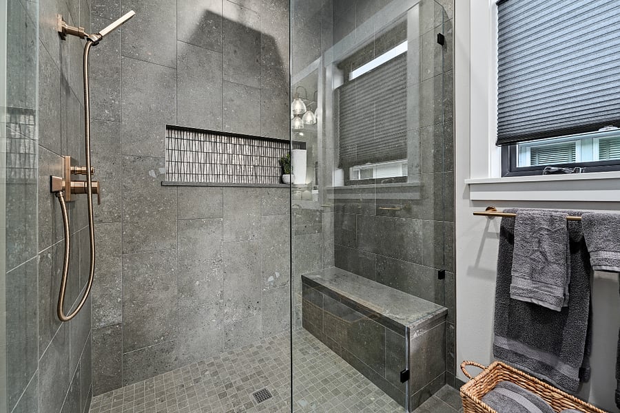 Zero ledge walk-in shower (primary bathroom)
