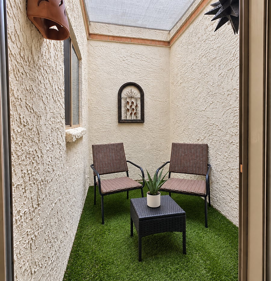 Light, airy Atrium off Dining Area and Kitchen