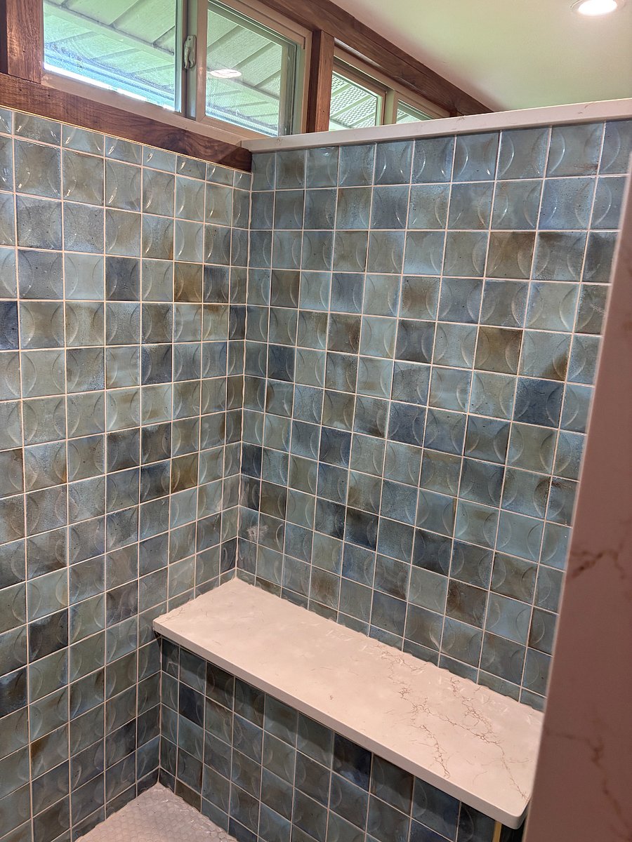Master bath shower sitting area.