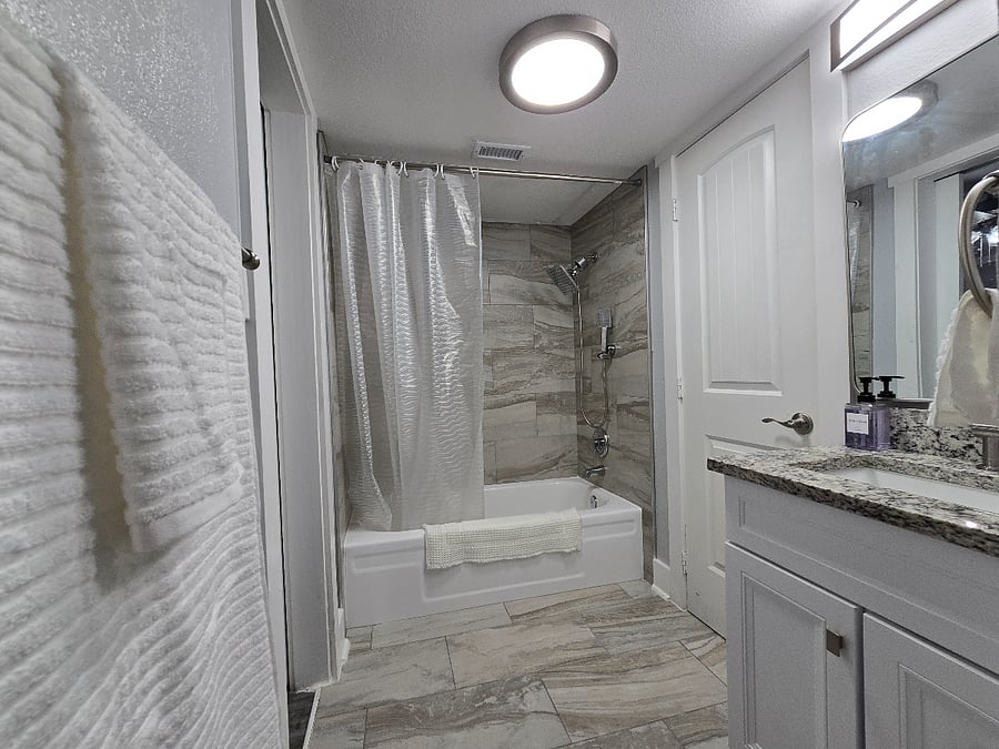 A modern, stylish shower and tub for a relaxing bath or refreshing shower.