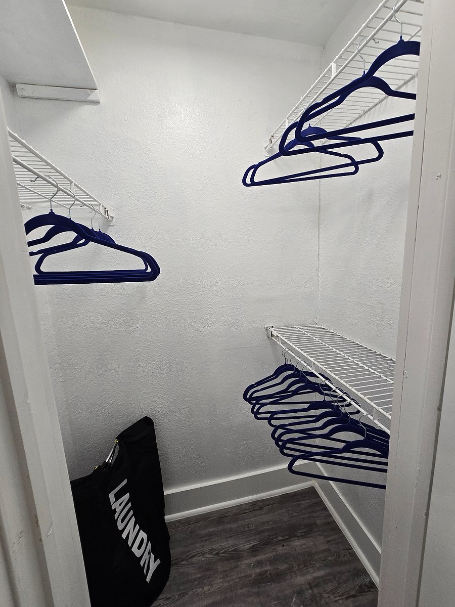 A walk-in closet is attached to second bedroom/bathroom for ample storage space.