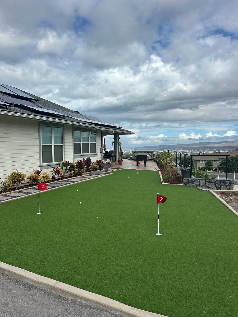 Side yard. Putt like a Pro! Golf net in garage. 