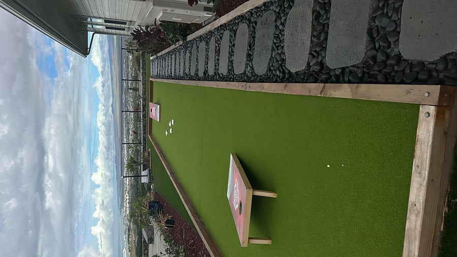 Separate Bocce Ball and Corn Hole Court. Fun!  