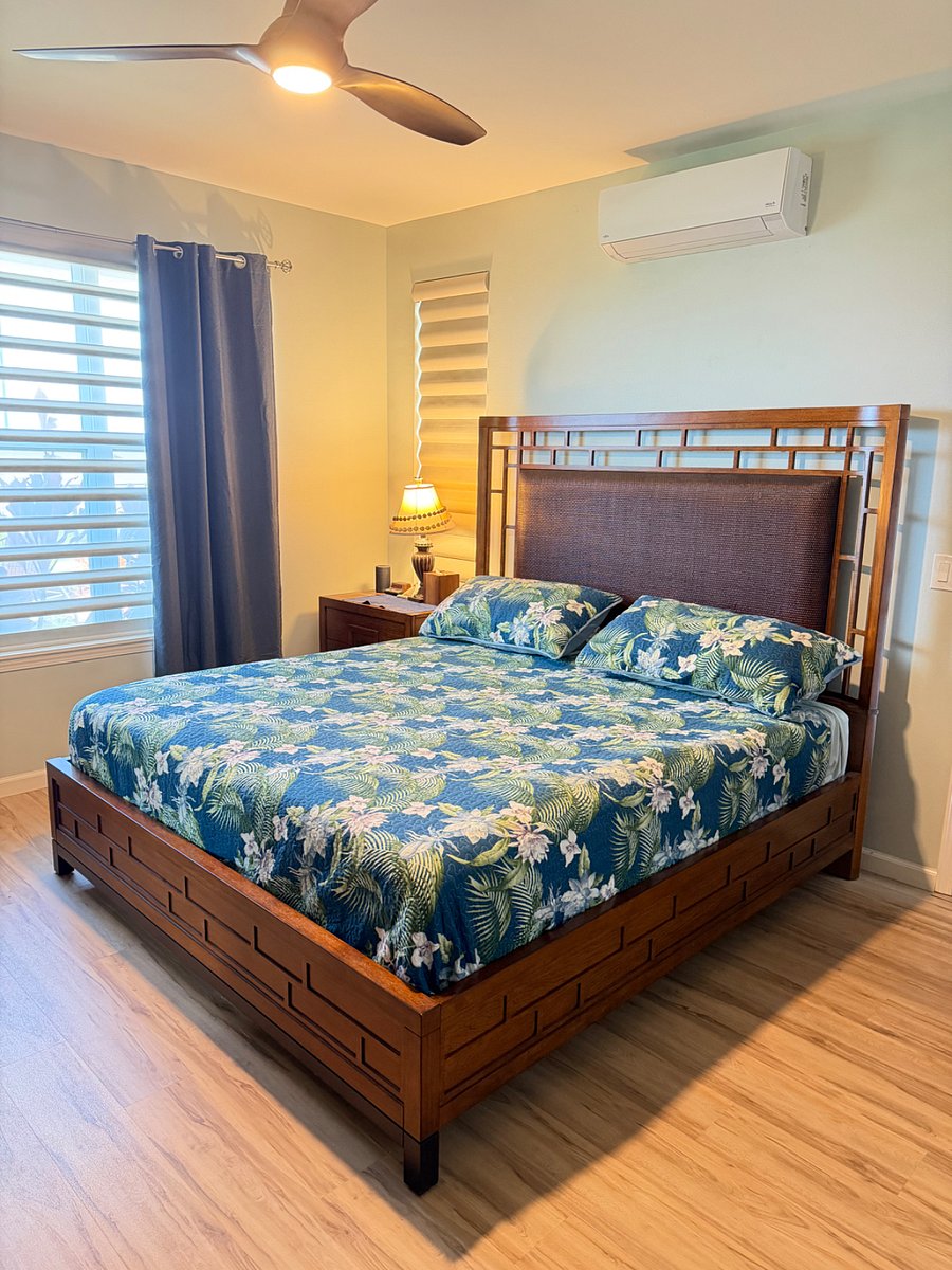 Sleep Number i10 wifi/bluetooth fully-adjustable King Bed with Tommy Bahama bed-frame. Matching triple dresser and 6 drawer upright not shown. 