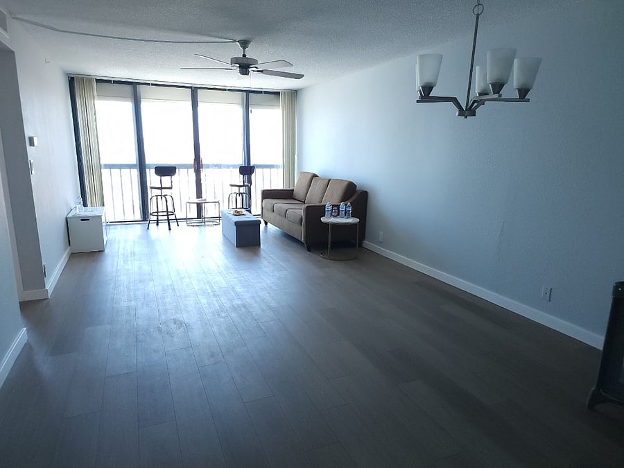 Living room sliders and windows have hurricane shutters