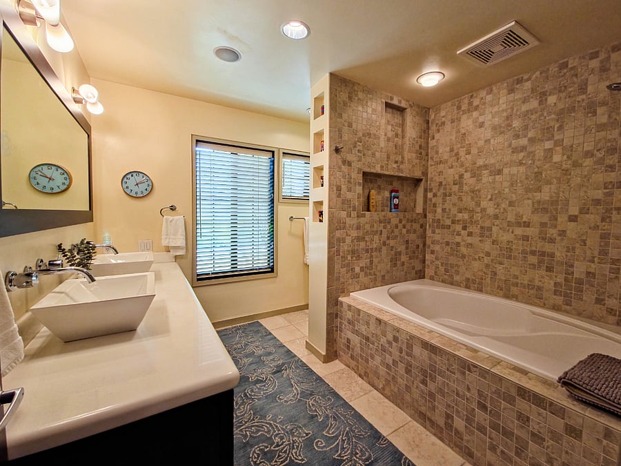 Primary bathroom. Includes large tub with shower head.