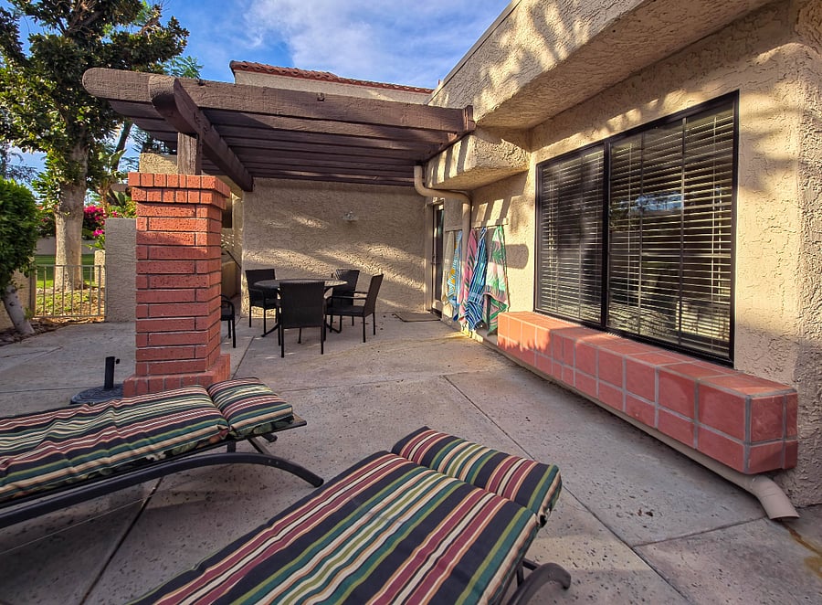 Back patio lounge and dining table.