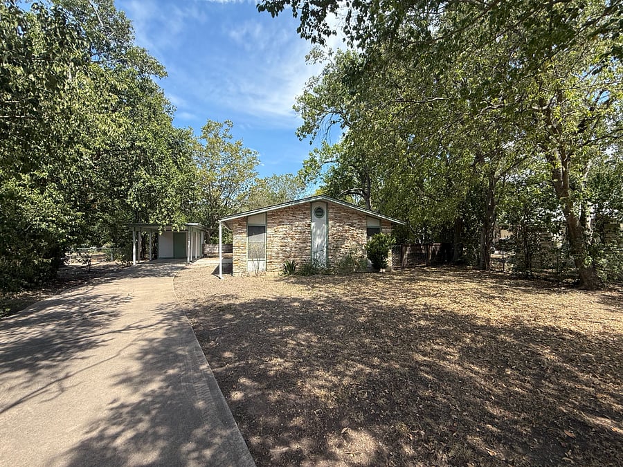 Driveway and shed (containing washer dryer and storage space)