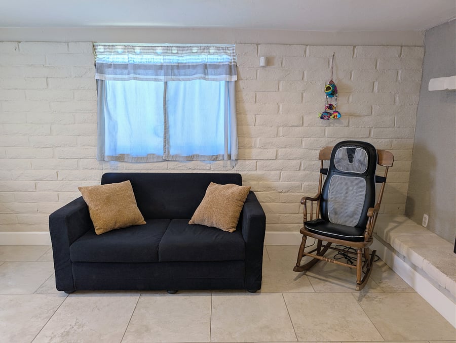 Sun Room with massage chair and fireplace