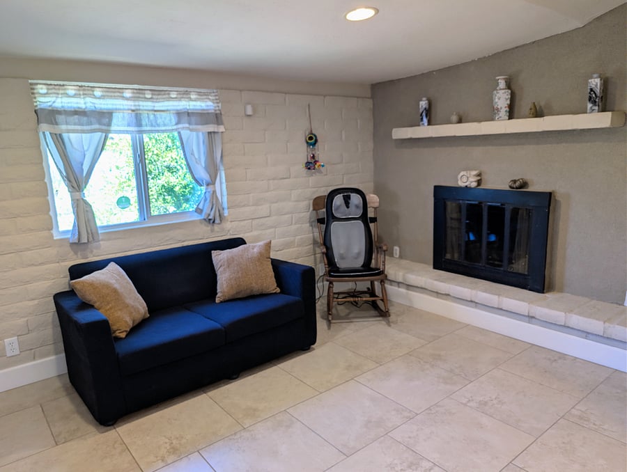 Sun Room with massage chair and fireplace