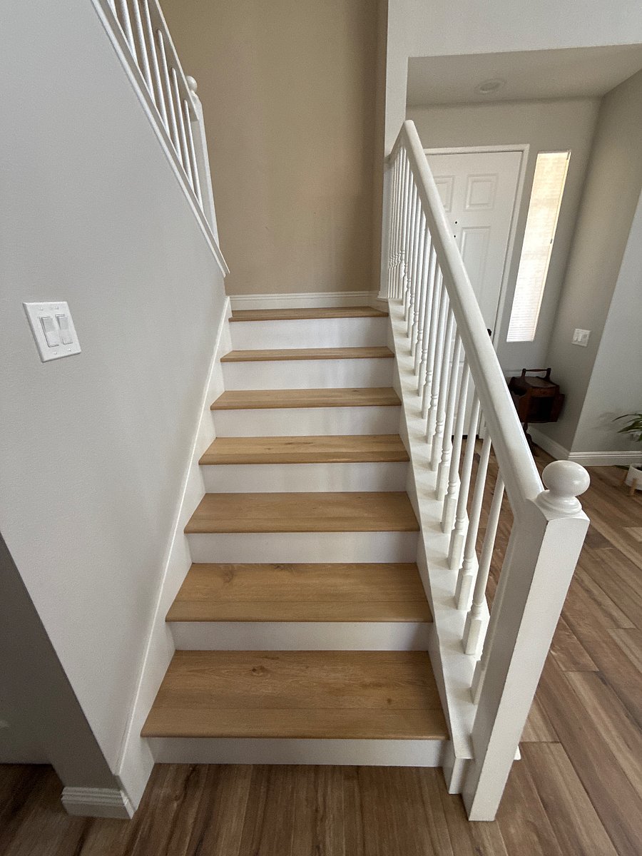 Engineered Hardwood floors throughout the upstairs and stairs.