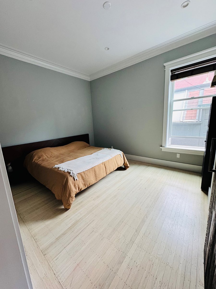 Bedroom with King bed away from street noise.