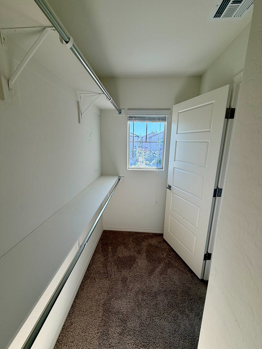 Spacious walk-in closet in master bedroom