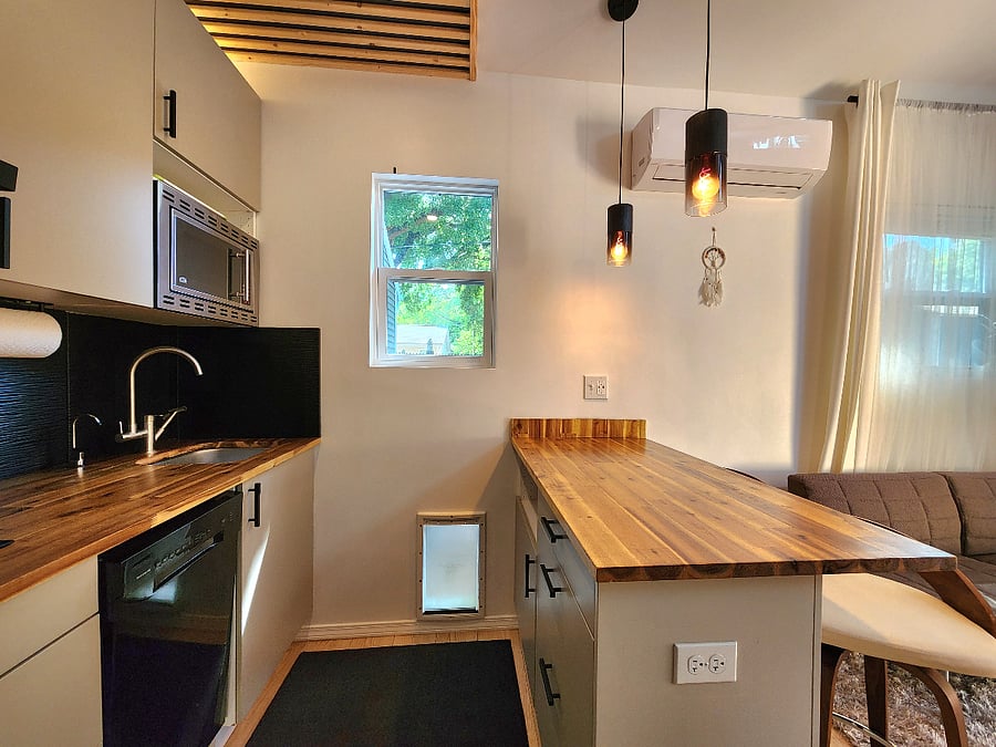 Butcher-style peninsula,  and a doggie door if you are bringing your pet!