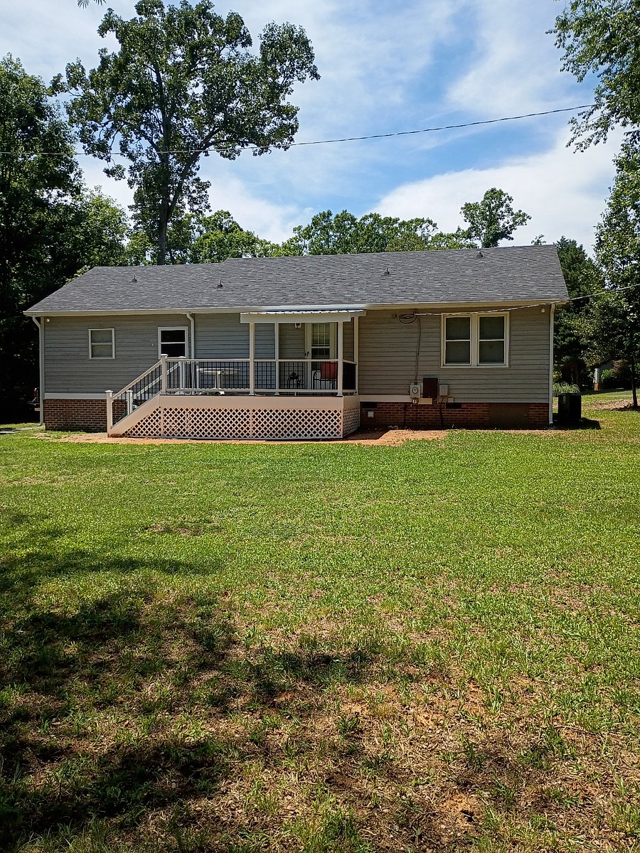 Back of Home with Deck/partially covered.