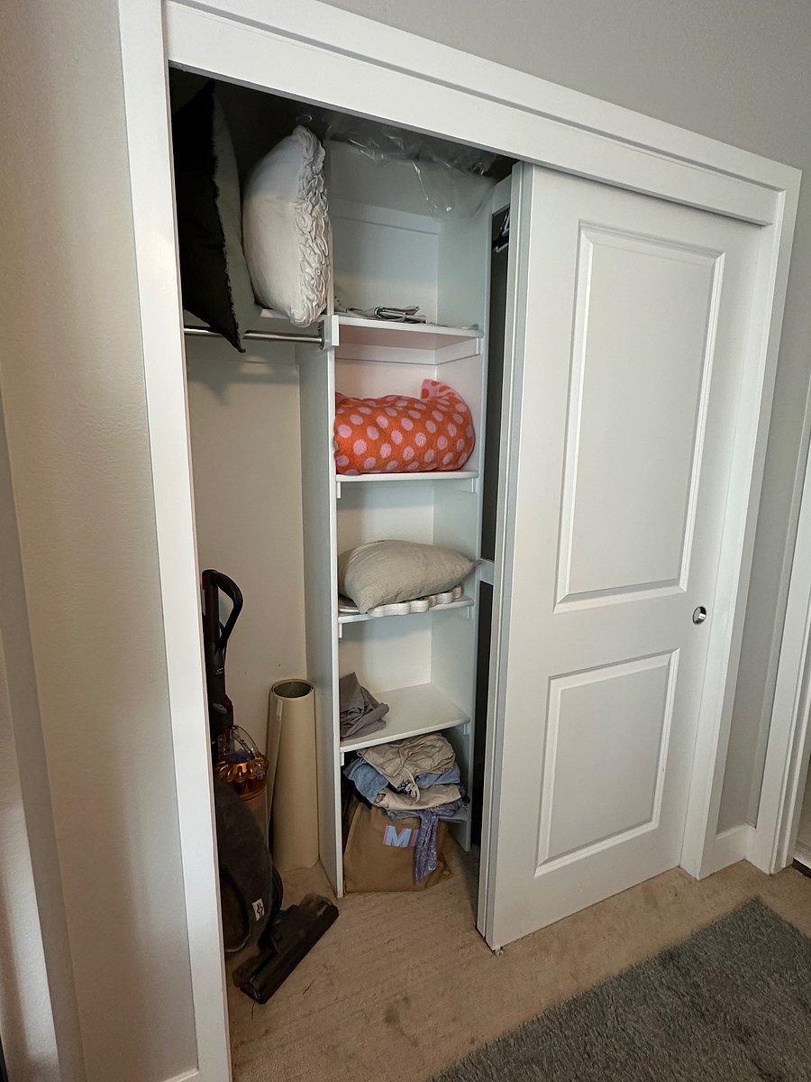 Closet- currently has shelving as shown and 3 bars for hanging clothes. Items shown will be removed prior to move in. 