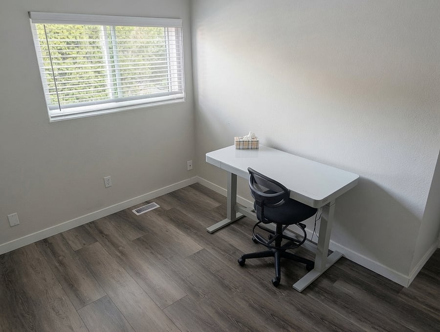 Desk and Chair in Upstairs Bedroom Office Space