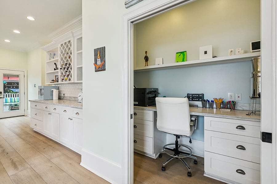 Desk area with pocket doors for maximum productivity